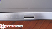 The fingerprint reader is located below the touchpad