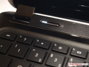 The power button features white illumination.