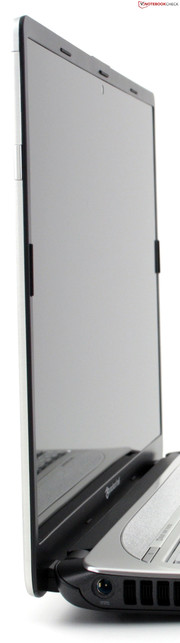 Packard Bell EasyNote NX69: The 14 inch screen with a narrow bezel is a real eye-catcher. The big surface is created by a kind of edge to edge plastic plate in front of the screen.