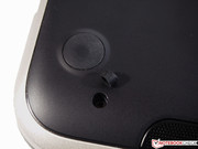 The case screws are hidden underneath rubber covers