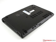 The bottom doesn't have any maintenance openings. The battery and hard disk are permanently built in.