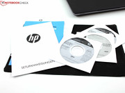 The accessories include DVDs for Windows 8 Pro 64-bit and Windows 7 Professional 64-bit.