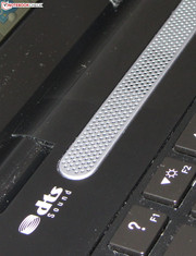 The speakers are underneath a perforated cover.