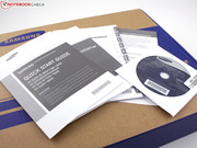 The accessories include a recovery disc for Windows Home Premium 64-bit.