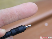 The power adapter's connector is as small as a smartphone's.