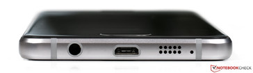 Lower edge: 3.5 mm headset jack, micro-USB port, speaker, microphone