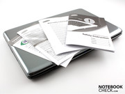 The supply division reports: No DVDs, only a quick guide and warranty documents.