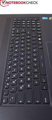The keyboard has blue backlighting.