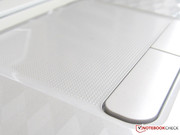 Dimpled surface of the touchpad.