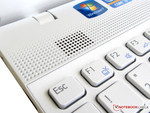 Two small speakers positioned above the keyboard to the left and right Two small speakers positioned above the keyboard to the left and right
