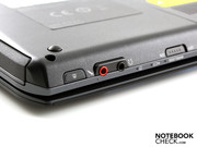 The front accommodates the audio ports, an eject button for the DVD drive