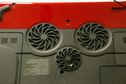 A closer look reveals two air intakes and a subwoofer, which improves the acoustic of the sound system further.