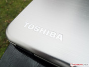 Toshiba used brushed aluminum.