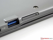 The SIM card is inserted here. The tray is pulled out with a paperclip.