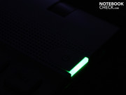 The power button constantly illuminates green, in standby it blinks orange.