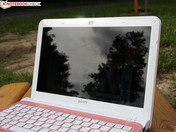 Side view, cloudy sky, reflections