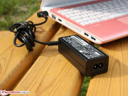 The small power adaptor delivers 40 Watts, enough for the maximum