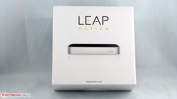 The box contains the device and two cables - the user has to download the drivers.