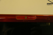 A 1.3 megapixel webcam is centered above the display. An integrated microphone is located a few centimeters next to it.