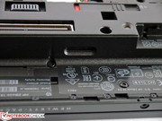 The SIM slot for the Huawei WWAN module is in the battery compartment.