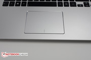 The touchpad is recessed slightly.