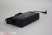 The large (16.5 x 8 x 4 cm) AC adapter provides 19.5 V of energy