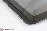 Speaker grilles line the bottom edge of the tablet