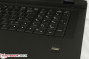 Full-size Numpad and arrow keys with fingerprint reader