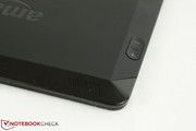 The plastic bar is now runs along the top back edge of the tablet