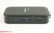 The front includes both USB 3.0 ports and audio inputs
