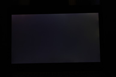 Light-moderate backlight bleeding around top corners