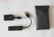 The two included dongles expand the device with a VGA and a LAN port,