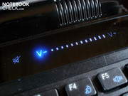 A touch-sensitive bar is above the keyboard.