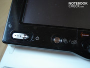 Power switch and button for swivelling the display