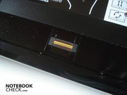 Fingerprint scanner between the mouse keys
