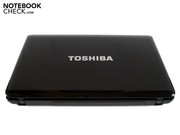 A large Toshiba logo adorns the notebook lid.