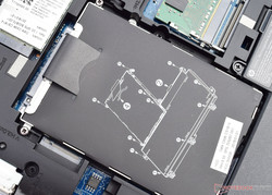 The installed 2.5-inch hard drive obstructs the M.2 slot