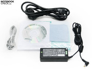 The accessories included with the Hawkforce Mobile.ForceM13.S1 comprise a modem cable, a driver CD, a micro fibre cloth for the display, a German manual, and the mandatory power supply unit.