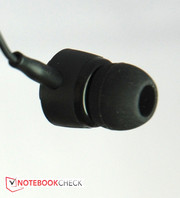 A headset with in-ear headphones is included.