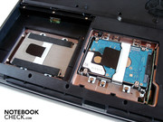 One hard disk is found under the battery, and two more behind an own cover.