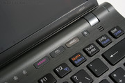 The DVD eject is placed above the keyboard beside the right loudspeaker.