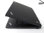 The case shows typical Thinkpad shapes with Clamshell display,...