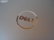 An elegant Dell logo adorns the laptop's lid.