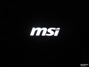 MSI's logo on the display's back in the dark.