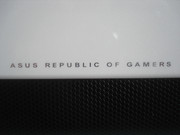 The otherwise white notebook lid has a black honeycomb pattern on the bottom half