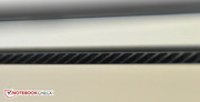 The warmth is expelled between the base unit and the display.
