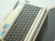 The microphone is integrated in the display bezel.