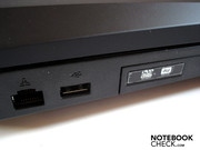 An RJ-45 LAN port, another USB and the DVD drive are positioned on the left-hand side,
