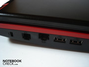 Kensington lock, RJ-11 LAN, 2x USB 2.0 on the left