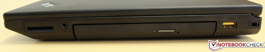 Right side: 4-in-1 card reader, headphone jack, DVD drive, powered USB 2.0 and Kensington Lock